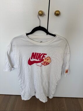 Nike White Tee with Red Logo and Cream Cartoon